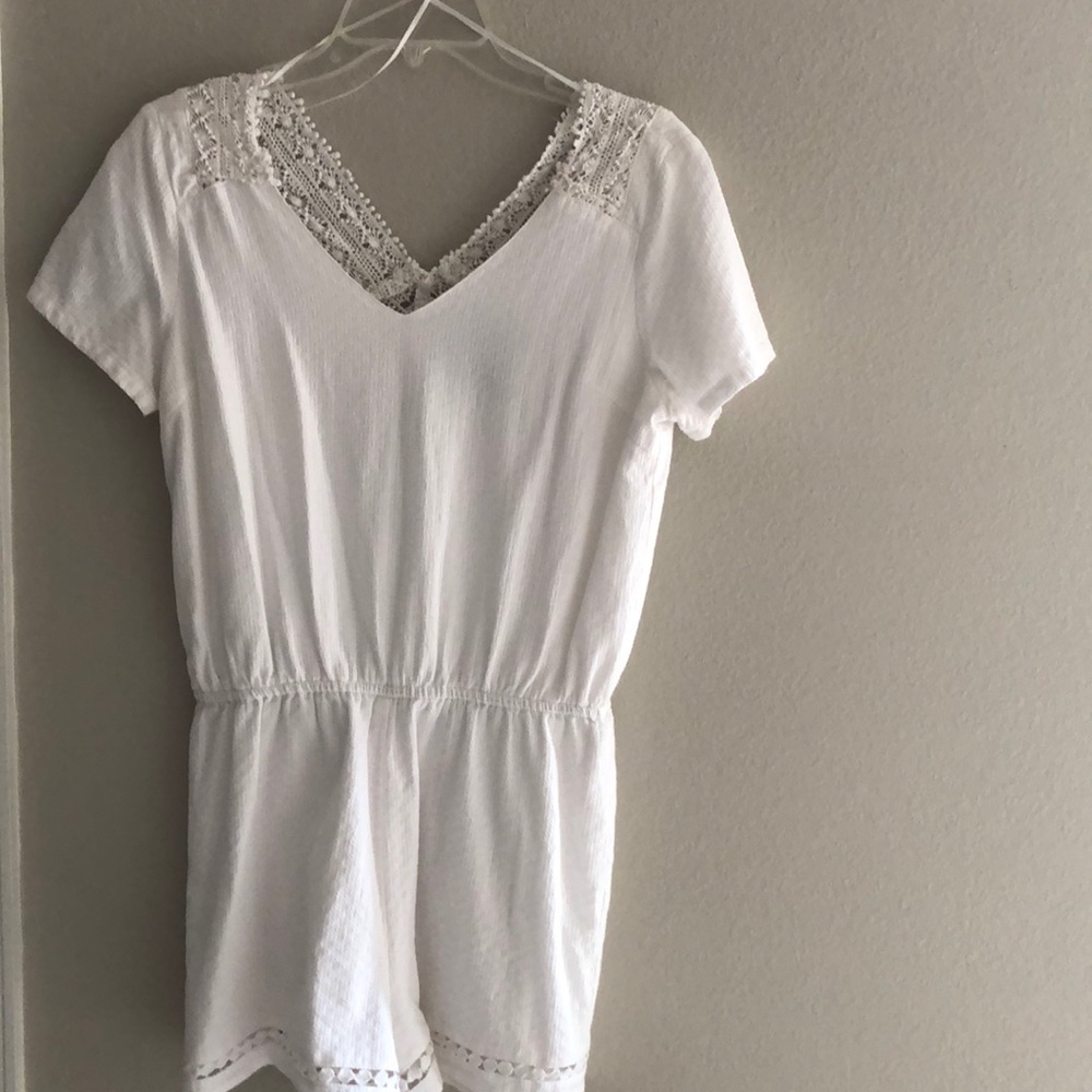 White romper shorts.